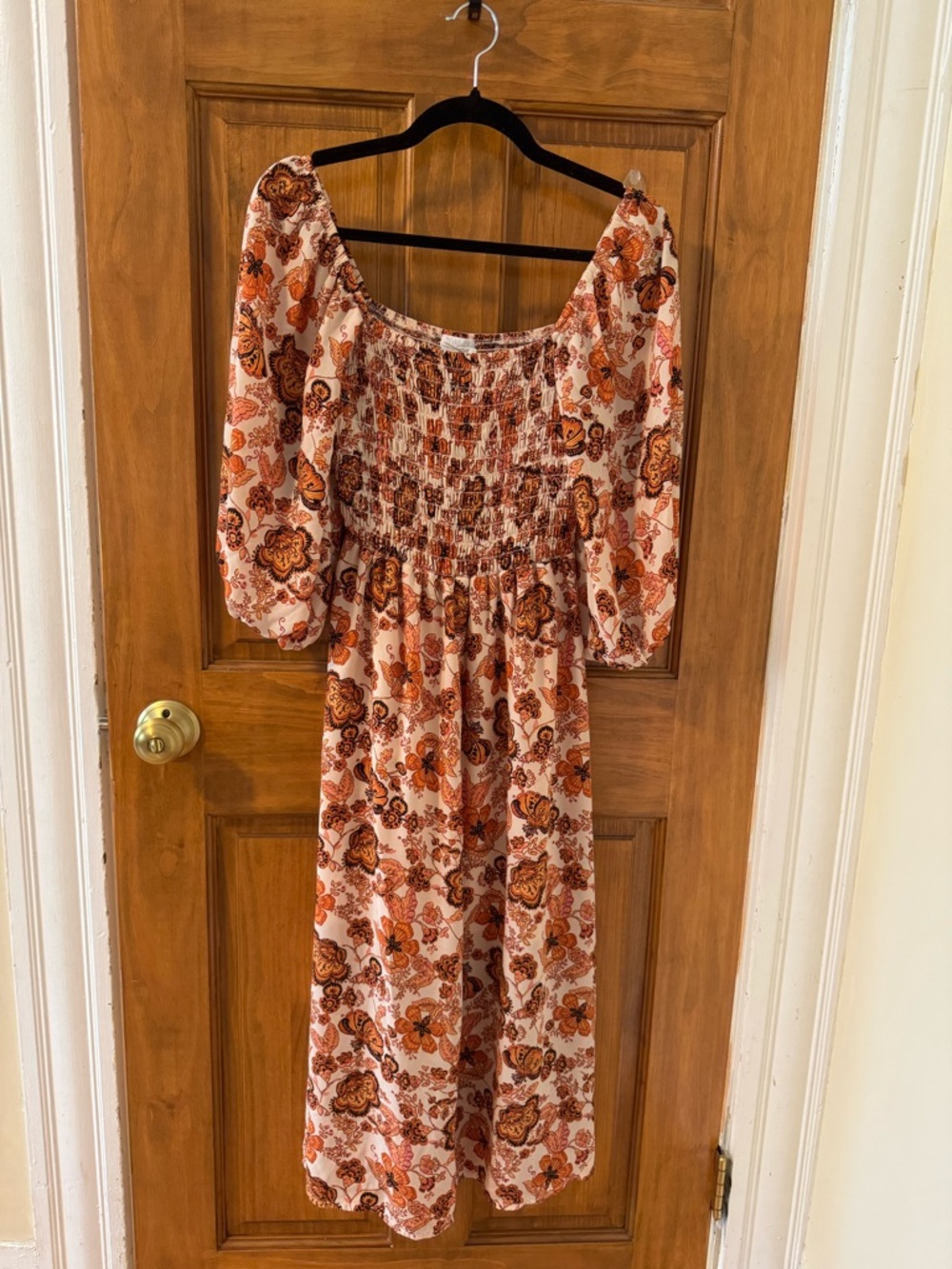 Sienna Sky Peach Floral Smocked Midi Dress with Rust Accents